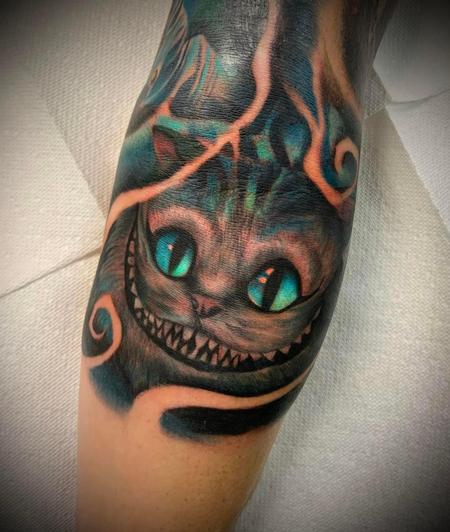 Izzy Gore - Cheshire Cat Tattoo